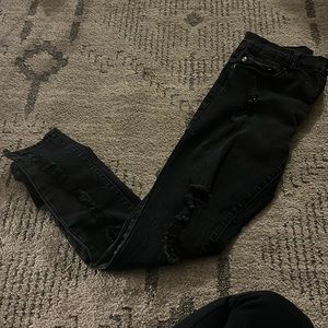 Black jeans with holes